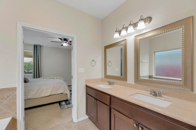 3624 Anchor Bay Dr, Pflugerville, TX 78660 - full bath with ensuite bathroom, double vanity, and ceiling fan