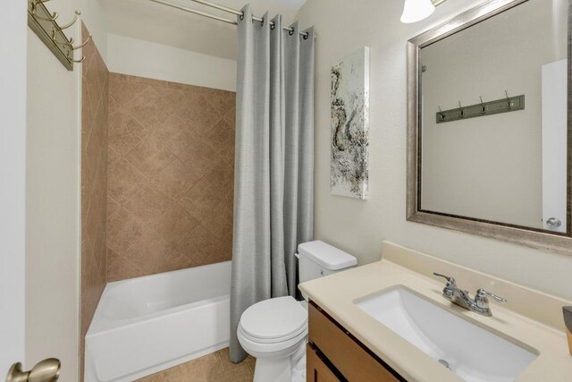 3624 Anchor Bay Dr, Pflugerville, TX 78660 - full bathroom with vanity, toilet, shower / bathtub combination with curtain, and tile patterned flooring