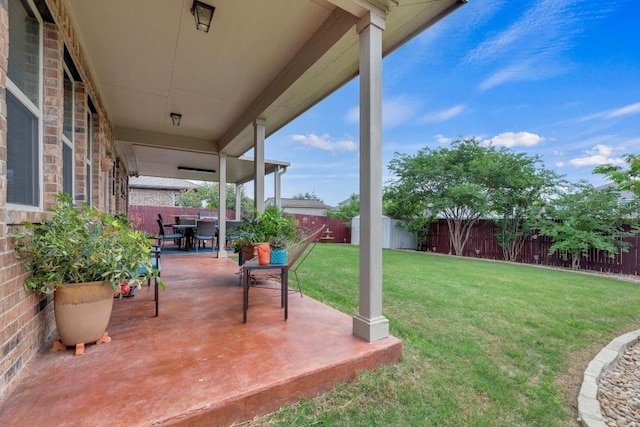 3624 Anchor Bay Dr, Pflugerville, TX 78660 - fenced backyard with a patio and outdoor dining space