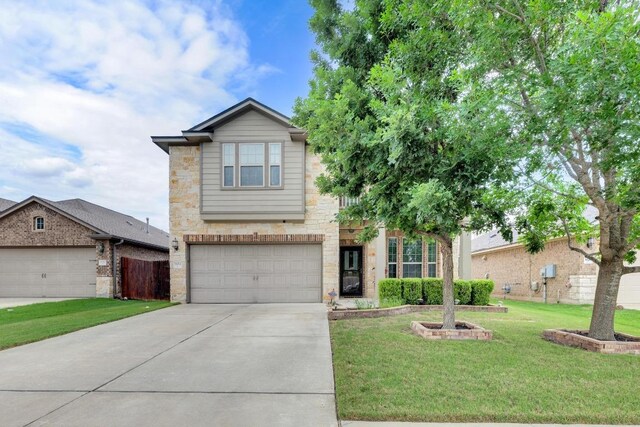 3624 Anchor Bay Dr, Pflugerville, TX 78660 - traditional home with concrete driveway, stone siding, and a garage