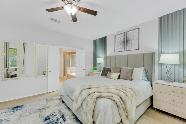3624 Anchor Bay Dr, Pflugerville, TX 78660 - carpeted bedroom with ceiling fan, ensuite bath, and baseboards
