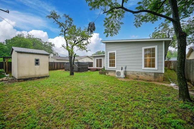 7004 Priscilla Dr, Austin, TX 78752 - rear view of property with ac unit, a storage unit, and an outbuilding