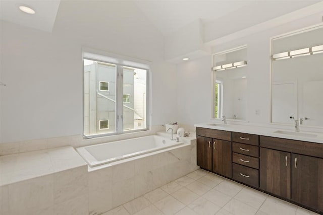 1500 Summit St Unit 5, Austin, TX 78741 - full bath with a garden tub, double vanity, lofted ceiling, and tile patterned floors