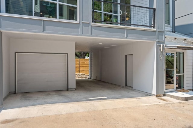 1500 Summit St Unit 5, Austin, TX 78741 - garage with a carport and concrete driveway
