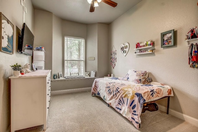 115 Loblolly Ln, Bastrop, TX 78602 - bedroom with carpet floors, baseboards, and ceiling fan