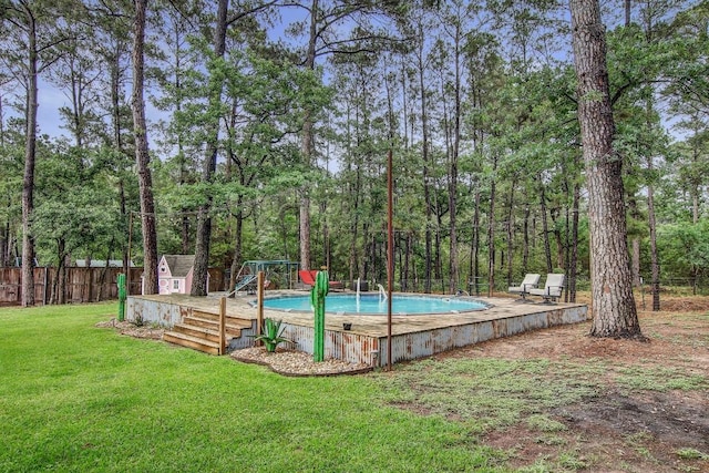 115 Loblolly Ln, Bastrop, TX 78602 - swimming pool with a storage shed, a playground, and an outdoor structure