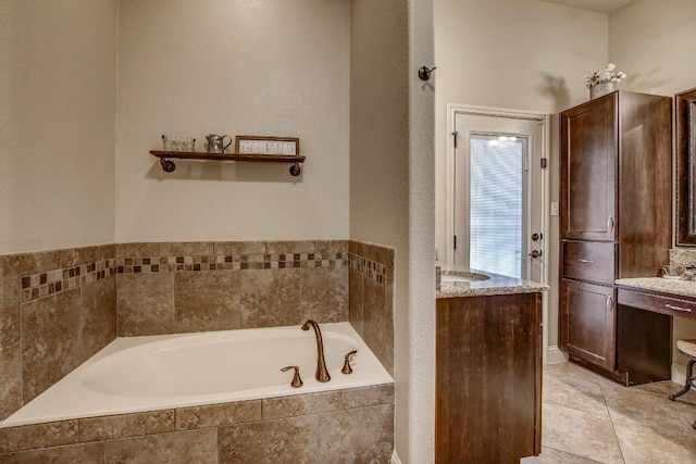 115 Loblolly Ln, Bastrop, TX 78602 - full bathroom with vanity, a bath, and tile patterned floors