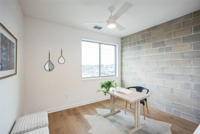 700 Denson Dr Unit 1101, Austin, TX 78752 - office featuring ceiling fan, wood finished floors, and baseboards