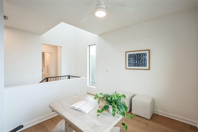 700 Denson Dr Unit 1101, Austin, TX 78752 - office featuring wood finished floors, baseboards, and a ceiling fan