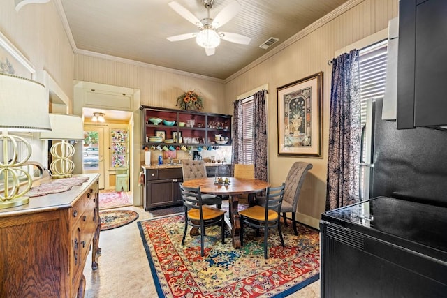 303 Austin St, Fredericksburg, TX 78624 - dining area featuring ornamental molding and ceiling fan