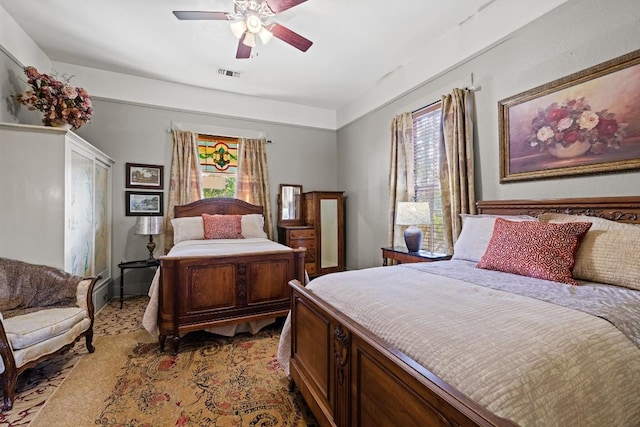 303 Austin St, Fredericksburg, TX 78624 - bedroom featuring multiple windows and ceiling fan