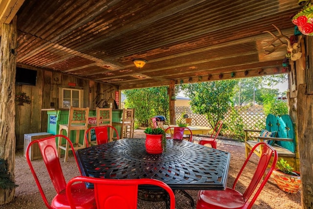 303 Austin St, Fredericksburg, TX 78624 - view of patio / terrace with outdoor dining space and fence