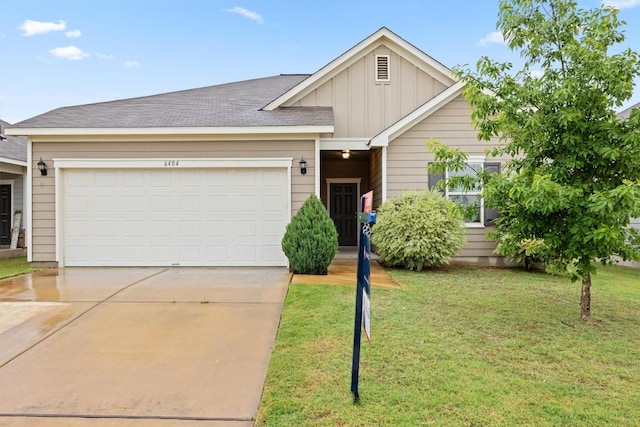 view of front of property featuring board and batten siding, concrete driveway, an attached garage, and a front lawn