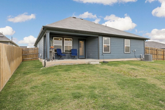 rear view of house featuring cooling unit and a patio