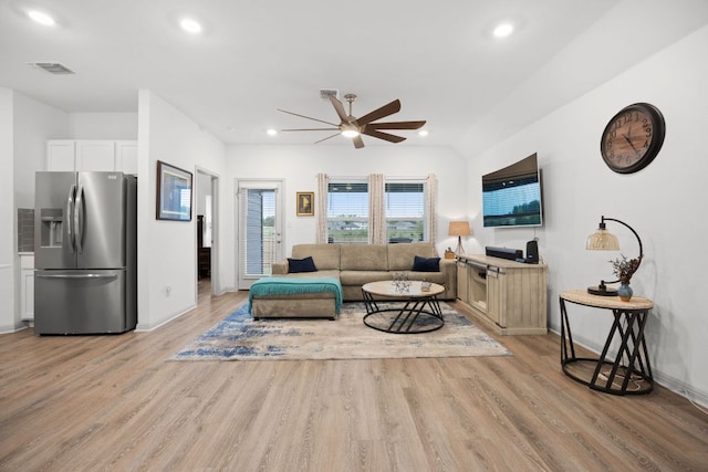 living area with a ceiling fan, light wood-type flooring, recessed lighting, and baseboards