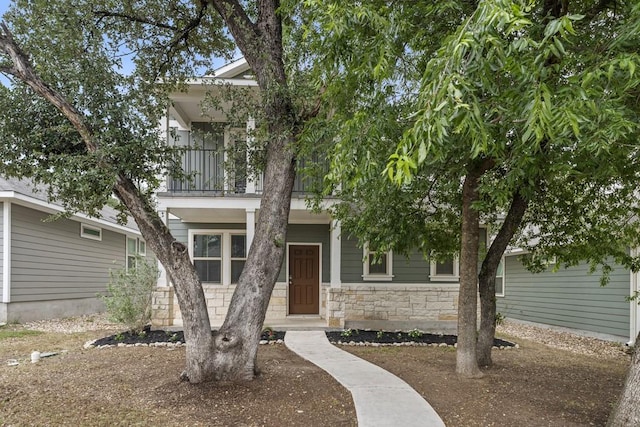 1808 Pecan Island Dr, Leander, TX 78641 - view of front of home featuring a balcony and stone siding