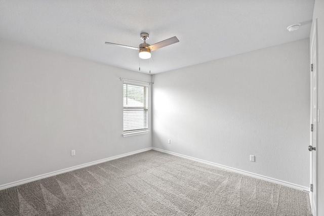 1808 Pecan Island Dr, Leander, TX 78641 - carpeted empty room featuring ceiling fan, baseboards, and a smoke detector