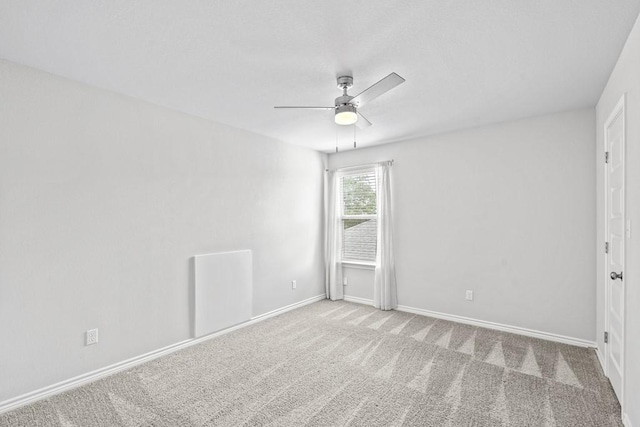 1808 Pecan Island Dr, Leander, TX 78641 - unfurnished bedroom with carpet floors, baseboards, and a ceiling fan