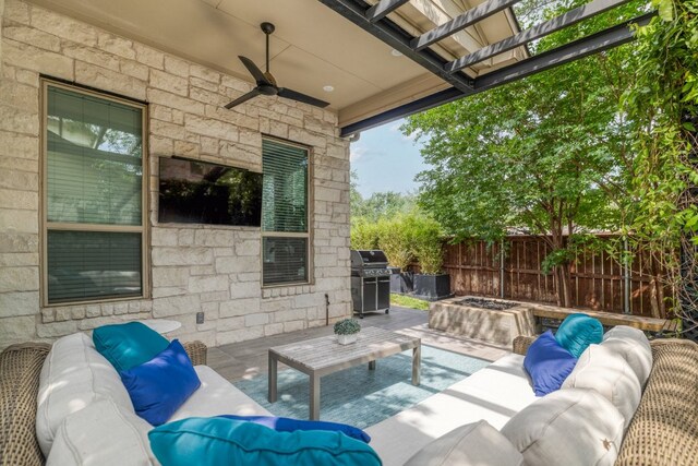 view of patio / terrace featuring outdoor lounge area, grilling area, fence, and a ceiling fan