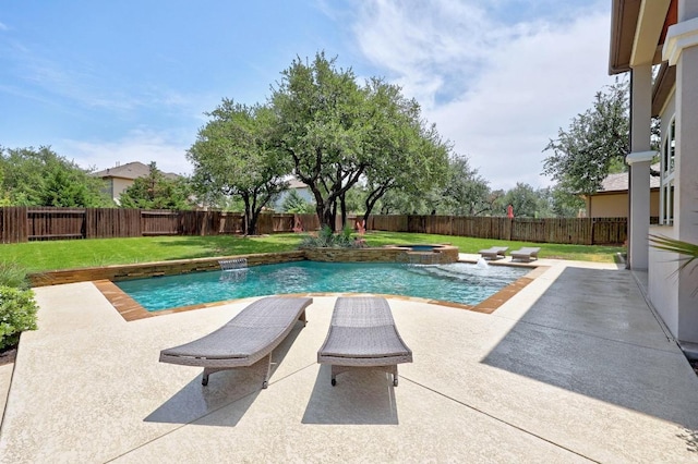view of swimming pool featuring a patio and a pool with connected hot tub