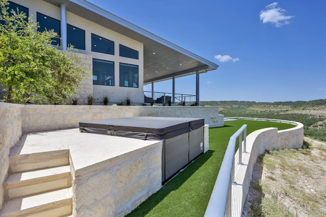 1785 Backbone Rdg, Wimberley, TX 78666 - view of patio with a hot tub