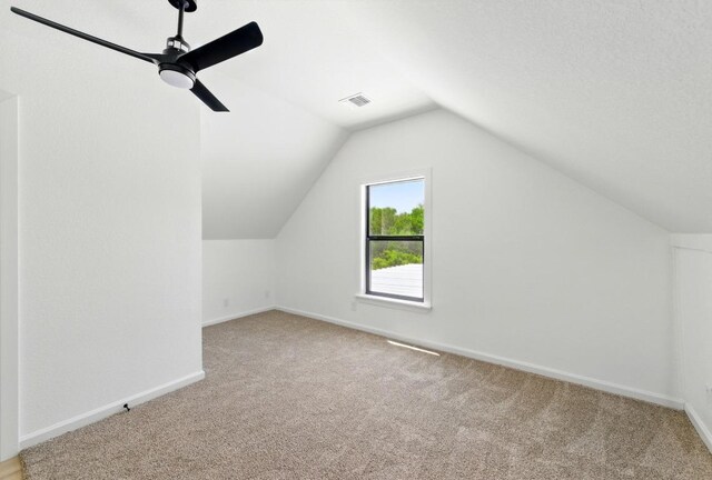 337 Forest Lake Dr, Del Valle, TX 78617 - bonus room featuring carpet floors, vaulted ceiling, and a ceiling fan
