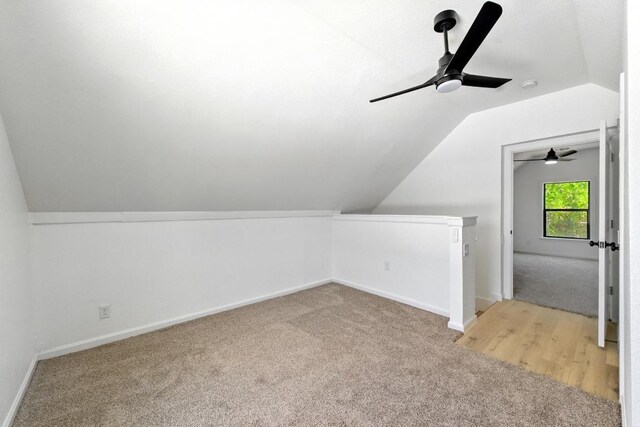 337 Forest Lake Dr, Del Valle, TX 78617 - additional living space featuring light carpet, vaulted ceiling, and a ceiling fan