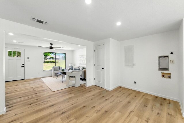 337 Forest Lake Dr, Del Valle, TX 78617 - living area featuring electric panel, light wood finished floors, recessed lighting, and ceiling fan