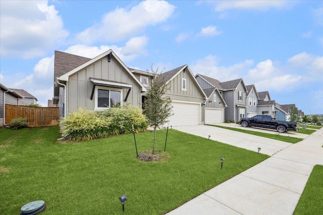 625 Jane Long Dr, San Marcos, TX 78666 - view of front of house featuring board and batten siding, concrete driveway, a residential view, and an attached garage