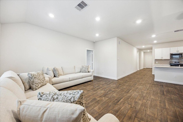 625 Jane Long Dr, San Marcos, TX 78666 - living room with dark wood-style floors, recessed lighting, baseboards, and vaulted ceiling