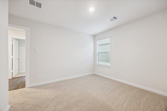 625 Jane Long Dr, San Marcos, TX 78666 - spare room featuring carpet flooring and baseboards