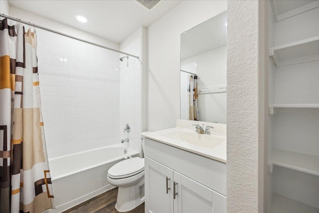 625 Jane Long Dr, San Marcos, TX 78666 - bathroom with wood finished floors, vanity, toilet, and shower / bath combo