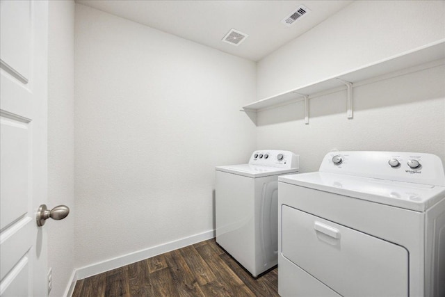 625 Jane Long Dr, San Marcos, TX 78666 - laundry room with washer and dryer, baseboards, and dark wood finished floors