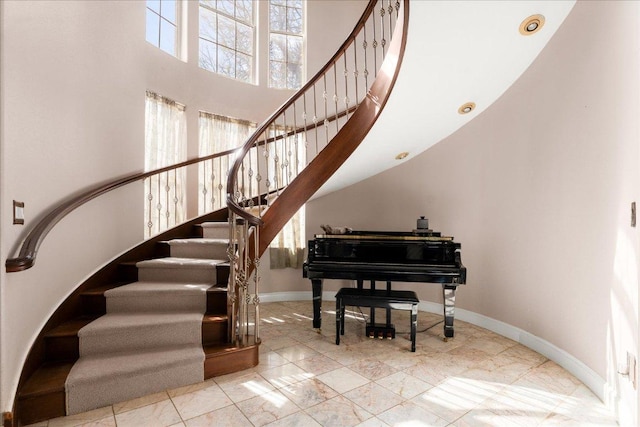 2604 Saratoga Dr, Austin, TX 78733 - stairway with baseboards and a high ceiling