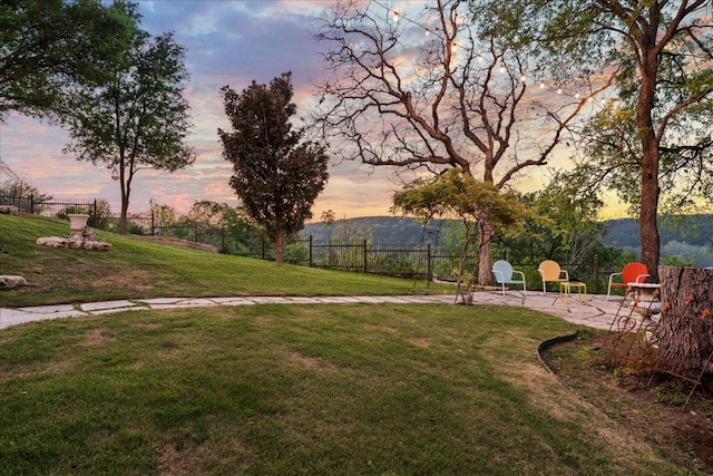 2604 Saratoga Dr, Austin, TX 78733 - view of yard at dusk