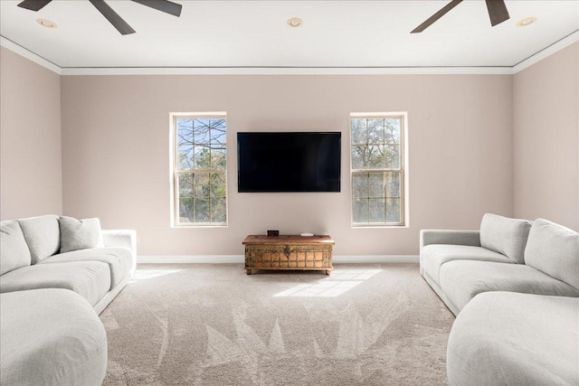 2604 Saratoga Dr, Austin, TX 78733 - carpeted living room featuring ceiling fan, crown molding, and baseboards