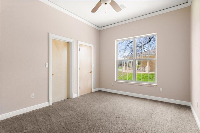 2604 Saratoga Dr, Austin, TX 78733 - carpeted empty room with crown molding, a ceiling fan, and baseboards