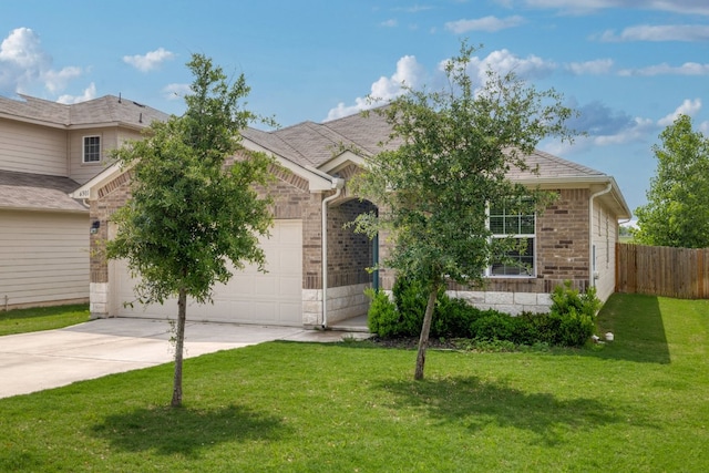 obstructed view of property featuring driveway, a garage, stone siding, and brick siding