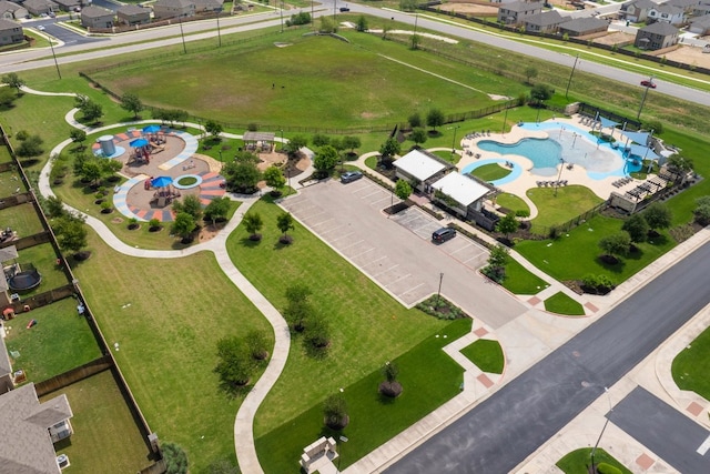 aerial perspective of suburban area with a pool area