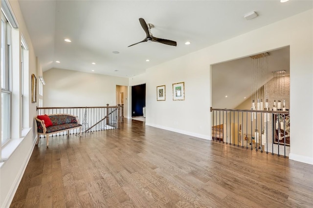 2212 Normandy Vw, Leander, TX 78641 - spare room with a ceiling fan, wood finished floors, recessed lighting, plenty of natural light, and vaulted ceiling
