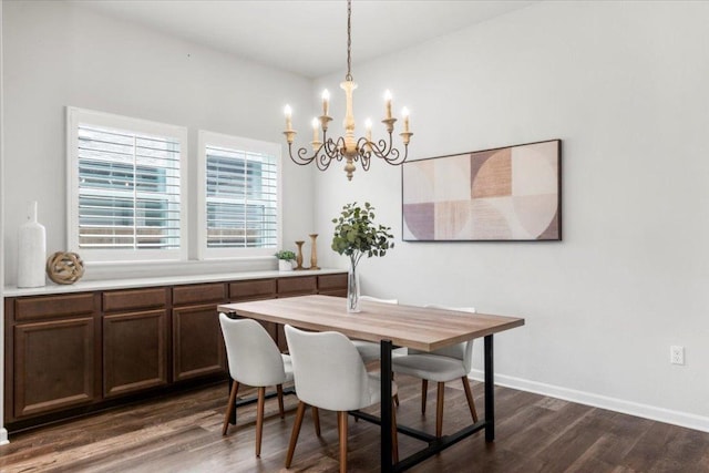7909 Catbird Ln, Austin, TX 78744 - dining room with a chandelier and dark wood-style flooring