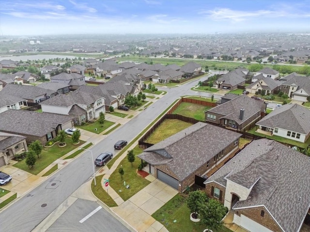 518 Algaroba Loop, Buda, TX 78610 - aerial view of residential area with a large body of water