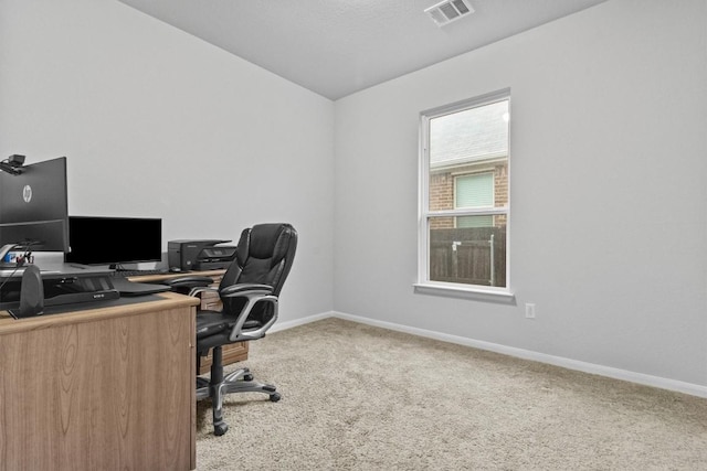 518 Algaroba Loop, Buda, TX 78610 - carpeted office space featuring baseboards and lofted ceiling