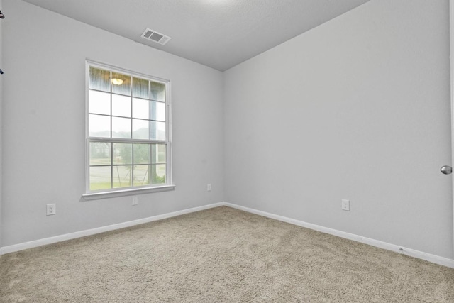 518 Algaroba Loop, Buda, TX 78610 - unfurnished room featuring carpet floors and baseboards