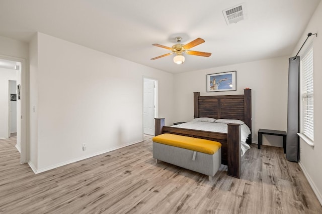 1320 Anna Palm Way, Round Rock, TX 78665 - bedroom with light wood finished floors and a ceiling fan