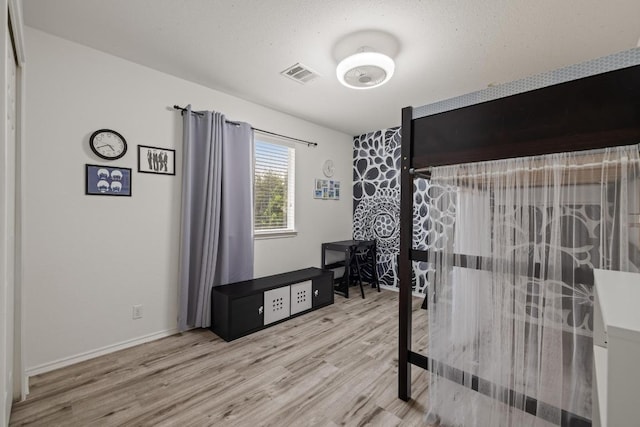 1320 Anna Palm Way, Round Rock, TX 78665 - bedroom with wood finished floors and an office area