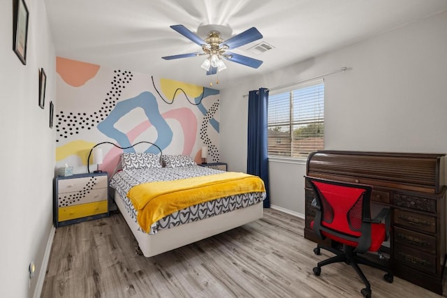 1320 Anna Palm Way, Round Rock, TX 78665 - bedroom featuring wood finished floors and a ceiling fan