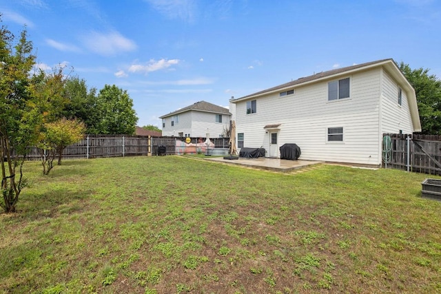 1320 Anna Palm Way, Round Rock, TX 78665 - rear view of house with a patio and a fenced backyard