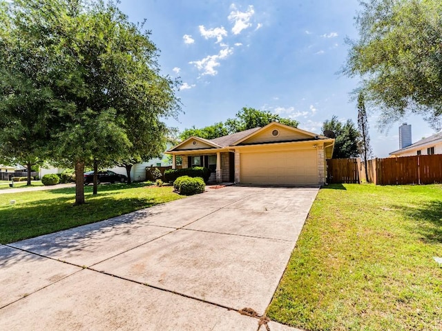 131 Ames Cv, Kyle, TX 78640 - ranch-style house with an attached garage and driveway