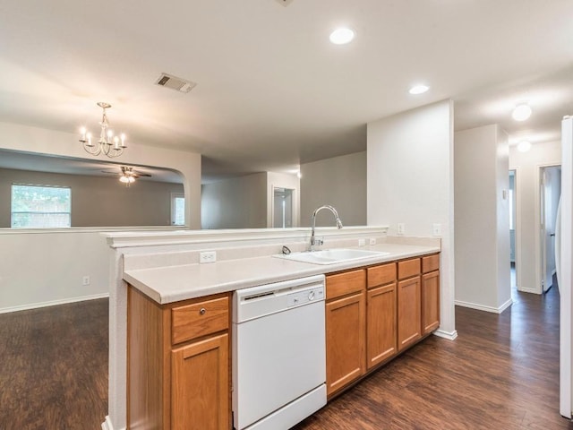 131 Ames Cv, Kyle, TX 78640 - kitchen with dishwasher, a sink, a chandelier, baseboards, and a peninsula